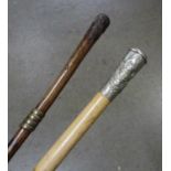 Two swagger sticks; one George VI Army Service