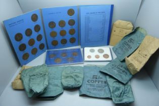 A folder of 1902-1929 pennies and two other coin sets