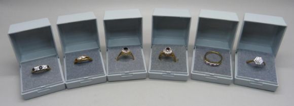 Six hallmarked silver gilt rings, sizes P and Q