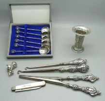 A set of silver spoons, a Mouse pendant marked 925, a small Victorian silver vase with London import