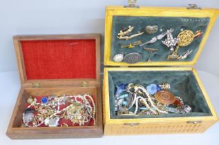 Two jewellery boxes containing costume jewellery