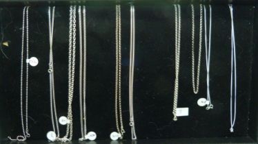 Ten silver chains, as new unused, various lengths and styles