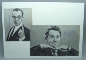 Morecambe and Wise autographed cuttings mounted on card