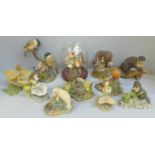 Seven Border Fine Arts figures of animals, two fairies, a Teviotdale figure of an otter and a