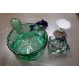 A Victorian green glass dump, large heavy green glass bowl, heavy glass ashtray, glass dolphin and