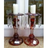 A pair of ruby flash glass lustres