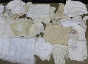 A box of 19th Century and later lace edged linen, table cloths, doilies, plus needlework linen,