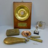 Military items; a 1914 Christmas tin, a mounted shell case base, shot flask, etc.