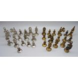 A set of metal chess pieces
