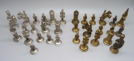 A set of metal chess pieces