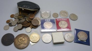 A collection of coins, commemorative coins, medallions and a football fob medal