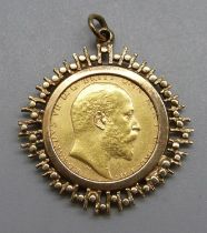 An Edward VII 1906 gold full-sovereign, Perth mint, in a 9ct gold pendant mount, total weight 10.8g