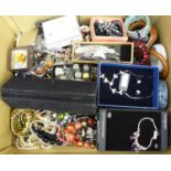 A large box of costume jewellery