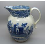 A Georgian blue and white pearlware jug depicting a boy with oxen