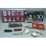 A collection of penknives a Higear utility knife, three keyrings, Princess Diana stamps, a £5 2012