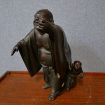 A large oriental bronze figure of a Buddha and child
