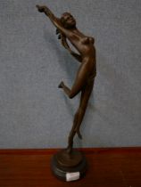 An Art Deco style bronze figure of a female nude, on black marble socle