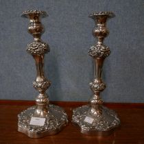 A pair of Sheffield plated candlesticks
