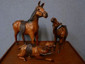 Two leather figures of camels and a horse
