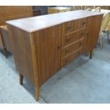 An afromosia concave sideboard