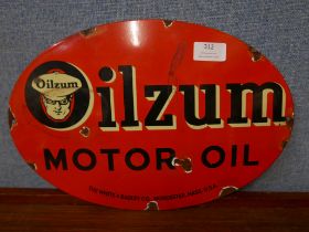 An enamelled Oilzum Motor Oil advertising sign