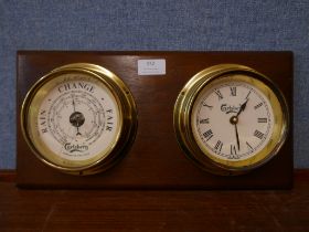 A wall mounted ships style brass clock and barometer, marked Carlsberg