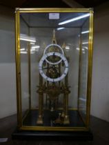 A cased brass fusee skeleton clock
