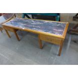 A G-Plan afromosia and granite effect Formica topped coffee table