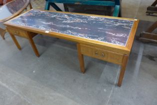 A G-Plan afromosia and granite effect Formica topped coffee table