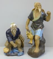 Two oriental fishermen figures