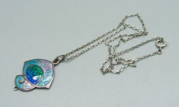 A silver and enamel pendant, Birmingham 1909, maker JF, on a silver chain, lacking pearl drop