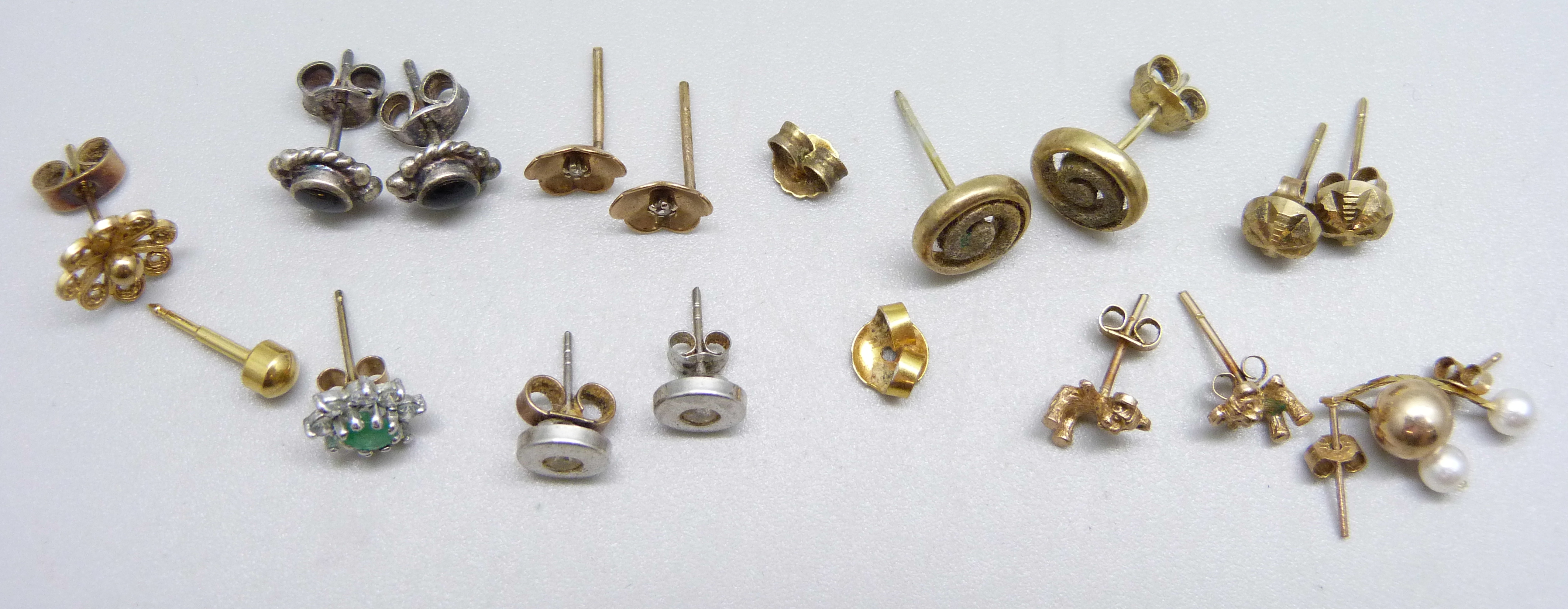 Six pairs of earrings and five single earrings, including one pair marked 9ct gold, 0.5g, and one - Image 2 of 2