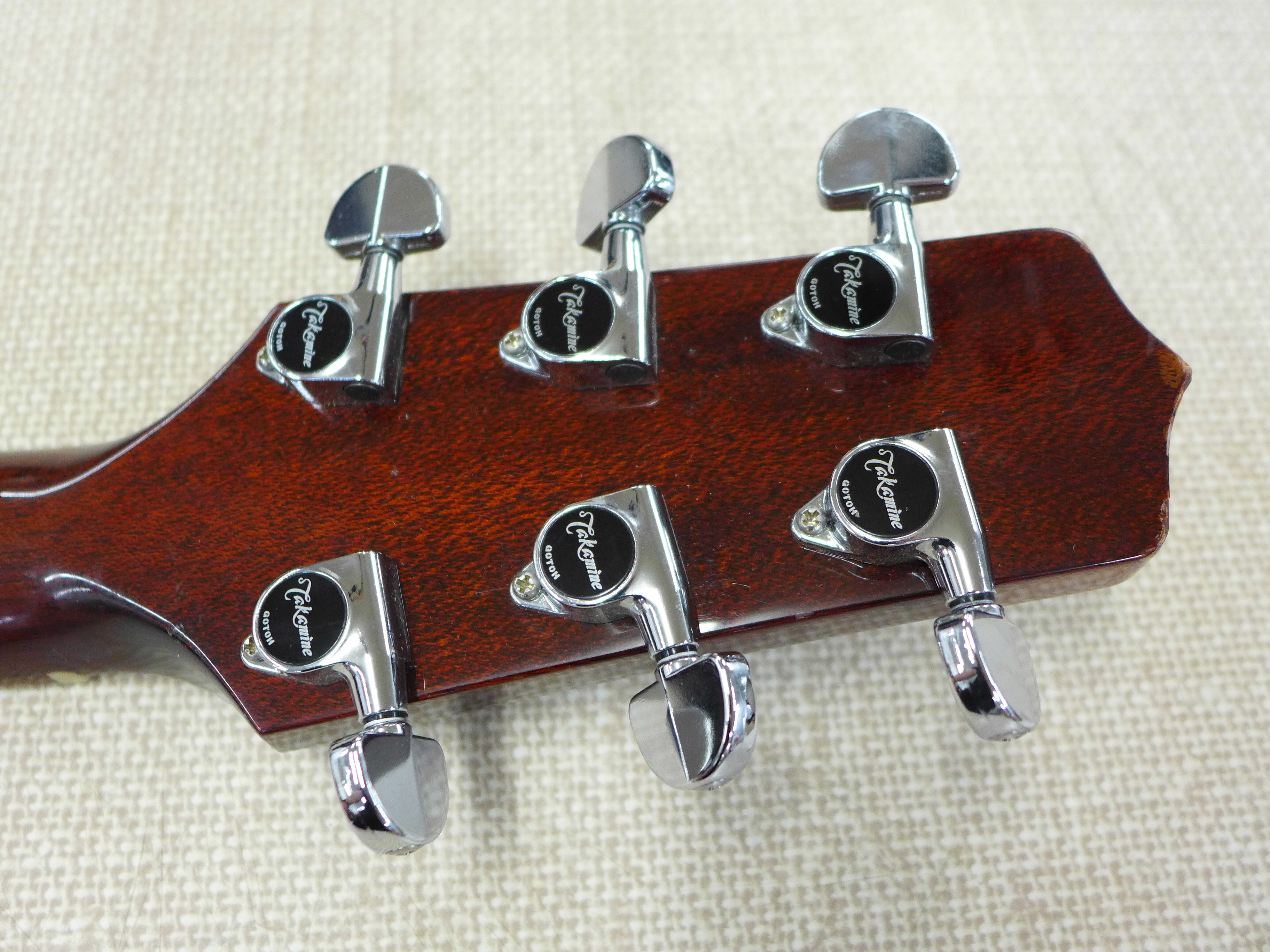 A Takamine classical guitar with a hard case and CT-4BII active pre-amp - Image 6 of 10