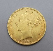 A Victorian 1884 gold half-sovereign