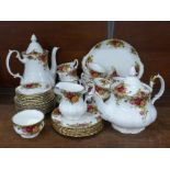A Royal Albert Old Country Roses coffee and tea service, one coffee cup, tea cup and cream jug a/f
