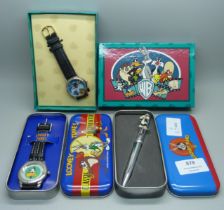 Two novelty Looney Tunes wristwatches and a pen