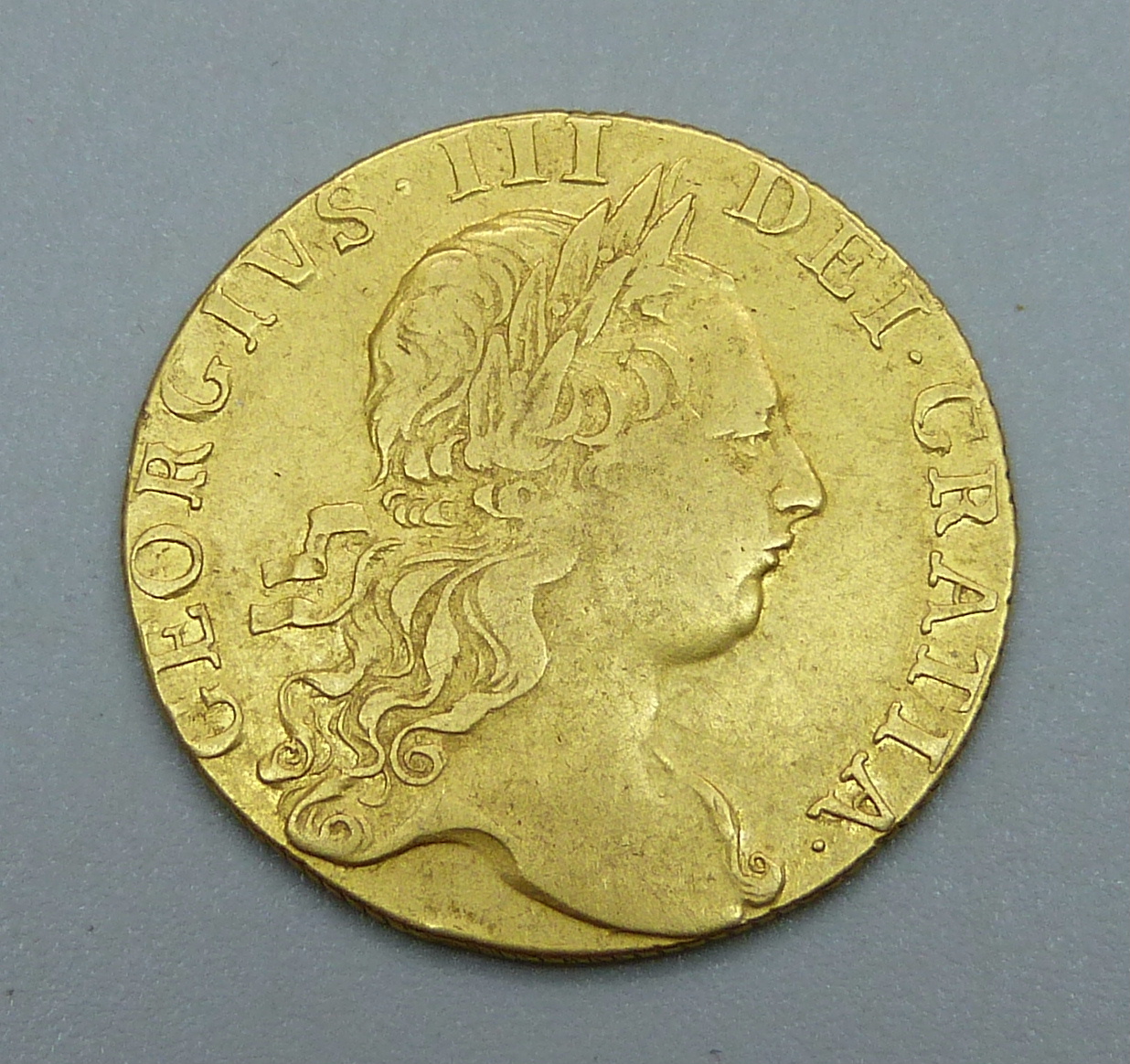 A George III 1765 gold guinea
