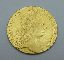 A George III 1765 gold guinea