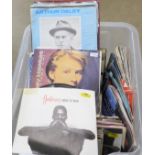 A box of approximately 150 1980s 7" singles, pop, rock, etc.