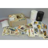 A collection of cigarette and tea cards