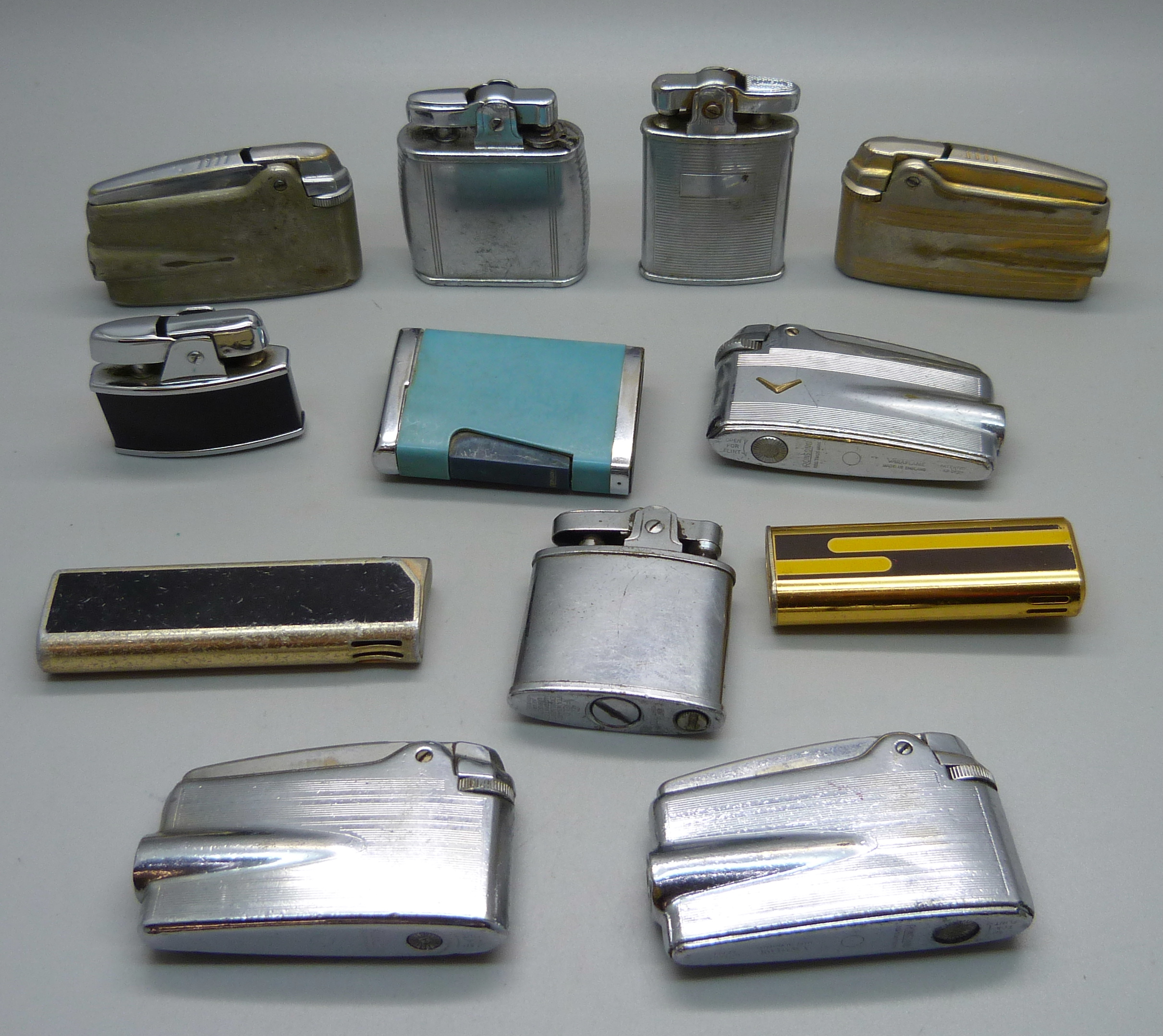 Twelve vintage 1960s Ronson lighters