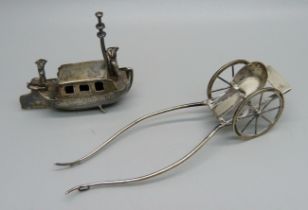 A sterling silver model boat, London import mark for 1900, Isaac Manheim importer, 28g, length