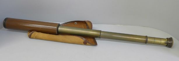 A leather covered three draw Ranger SS telescope, in a canvas case