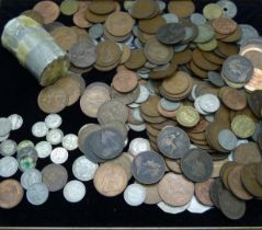 A collection of assorted UK coins, including thirteen silver 3d and a roll of commemorative crowns