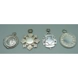 Four silver fob medals, including one football medal with inscription, 'Belfast Garrison League,