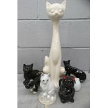 A box of cat figures including one large long neck cat **PLEASE NOTE THIS LOT IS NOT ELIGIBLE FOR