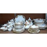 A collection of Royal Albert Old Country Roses including a cake stand, fourteen side plates, six