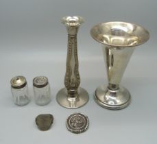 A small silver topped salt and pepper pair, a/f, an Isle of Man brooch lacking pin, a ring made from