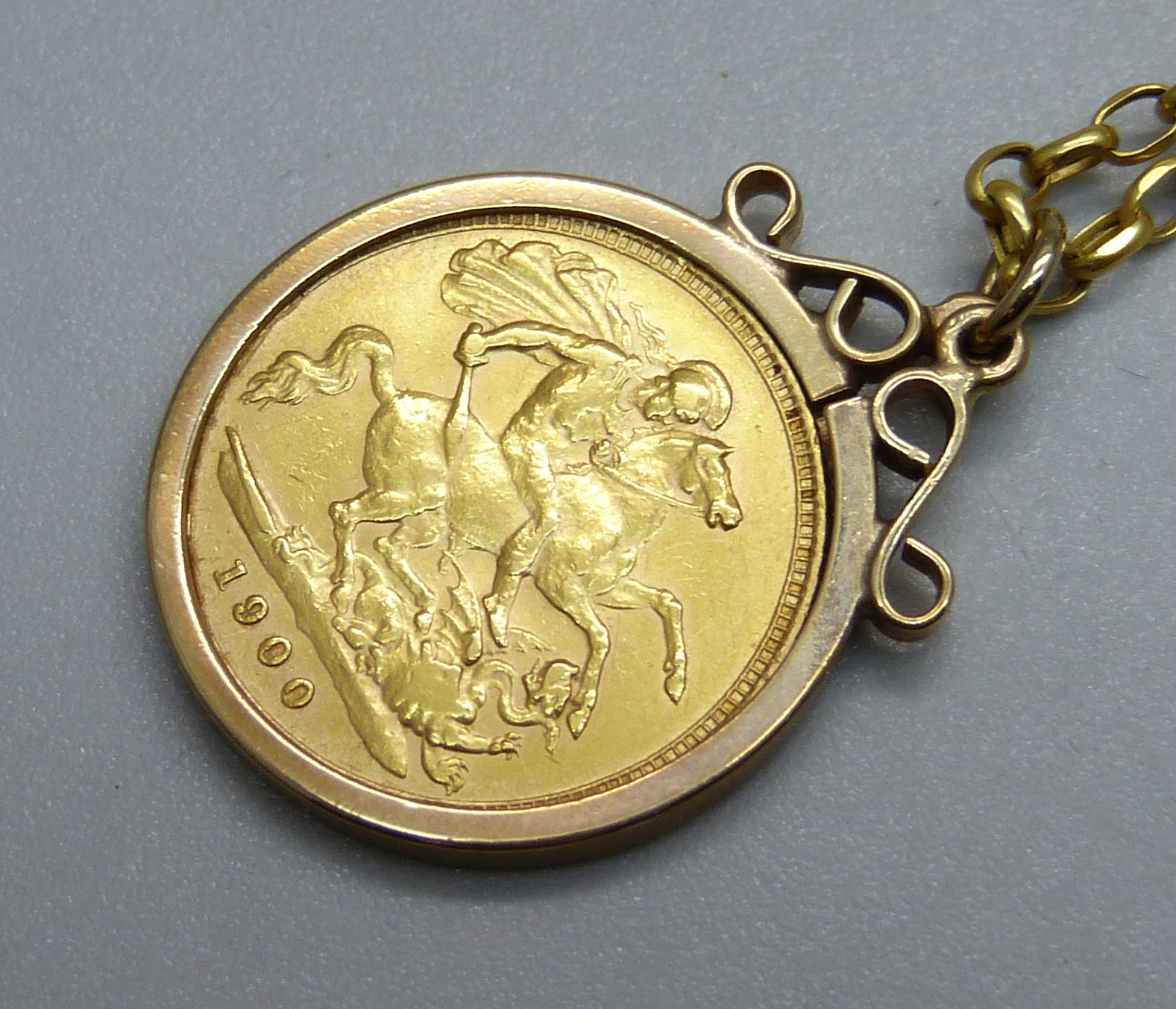 A Queen Victoria 1900 gold half-sovereign in a 9ct gold pendant mount and on a 9ct gold chain, total - Image 3 of 3