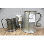 Two tankards, one with novelty pipe handle and a horse bottle pourer